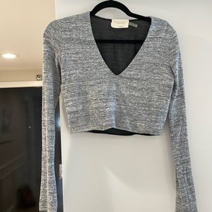 Alice + Olivia by Stacy Bendet Long sleeve V-neck crop top.